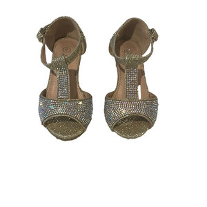Gold sequined children’s dress shoes